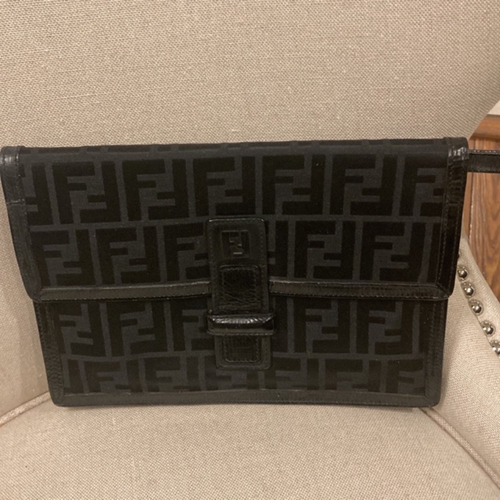 Fendi Zucchino clutch with strap.